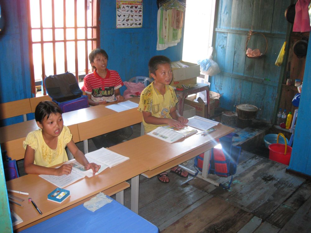 VVV Children Studying inside a Small Classroom